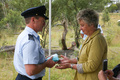 No 9 Squadron Association Stanthorpe A2 378 ceremony photo gallery - RAAF Ensign present to Geraldine Lloyd
